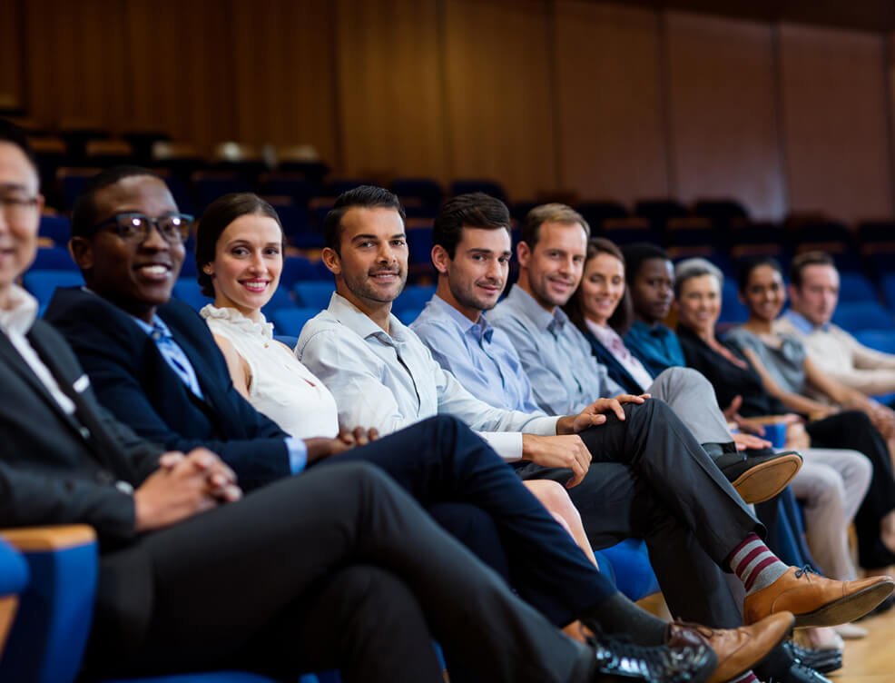 Conference attendees in auditorium